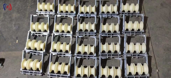 Tirar de manera eficiente tres haces de cables de sección transversal pequeña con bloques de cuerda del conductor